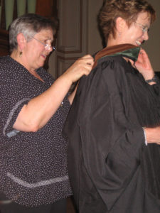 Janet being hooded