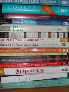 A pile of writing craft books