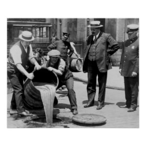 Prohibition cops dumping liquor